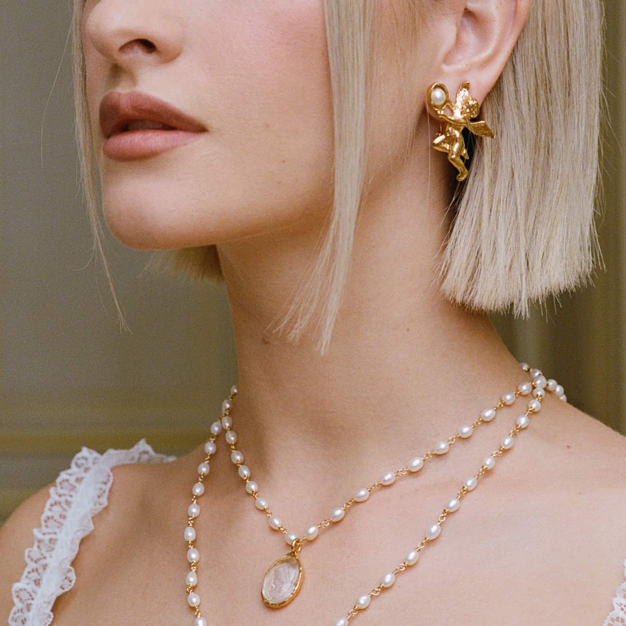 Gold-plated pierced earrings Unexpected encounter