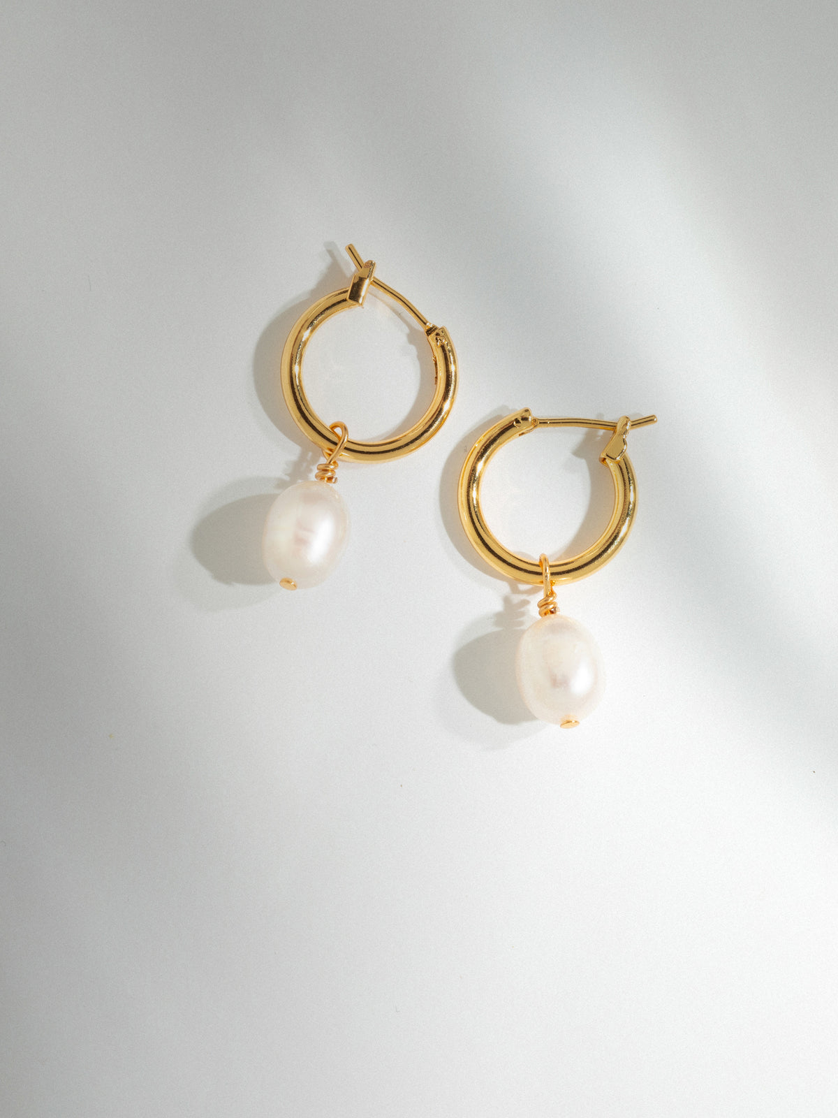Boucles d'oreilles dorées Charms