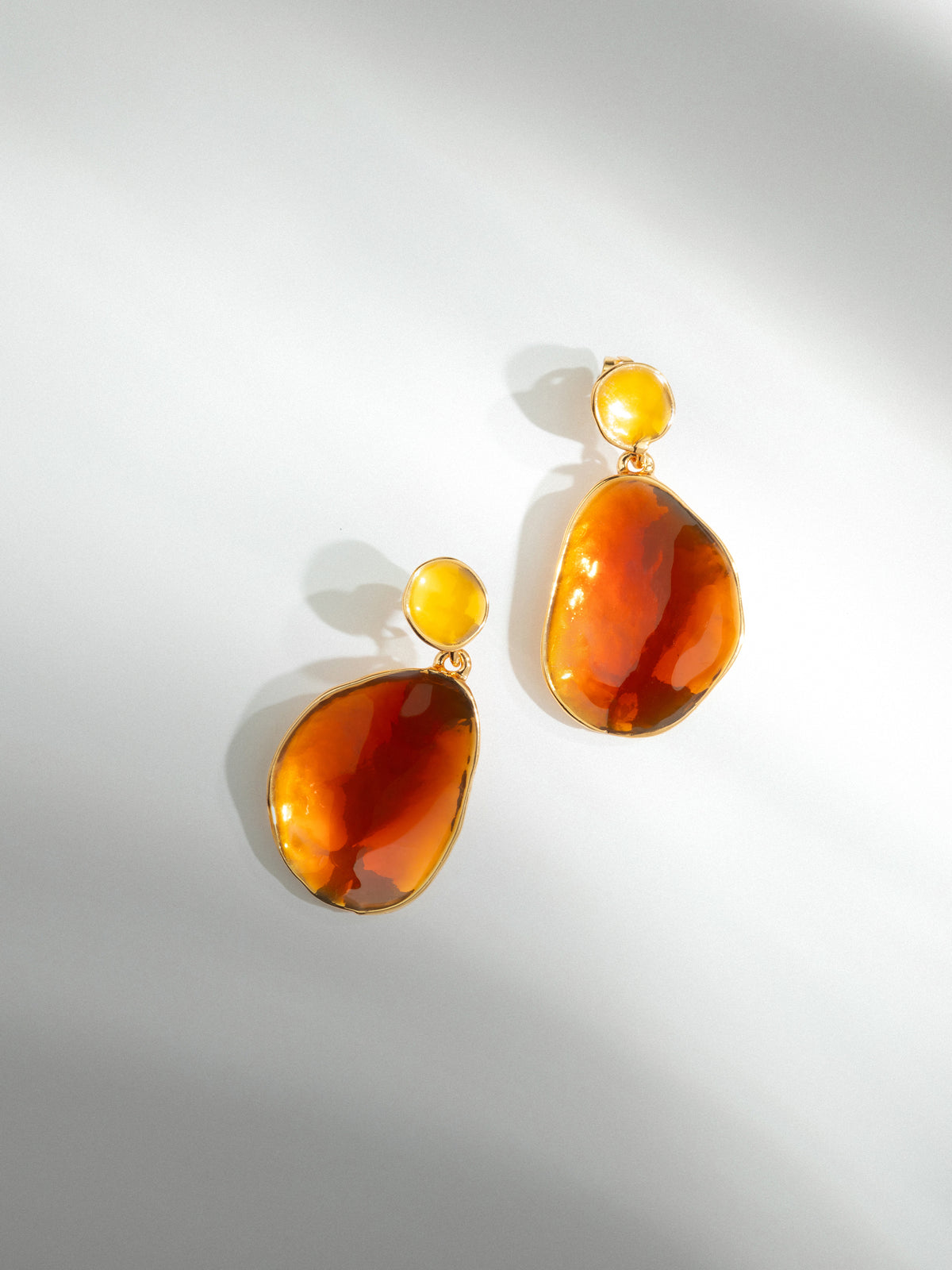 Pierced gold earrings First date